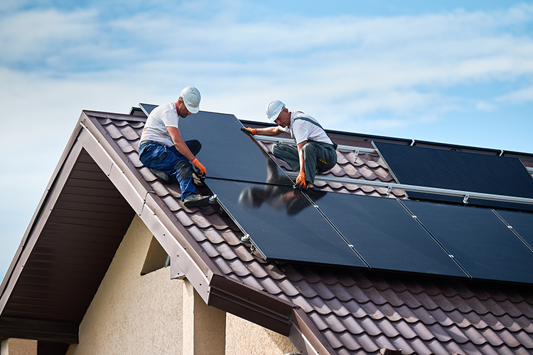 solar-panels-men-roof solar-panels-men-roof