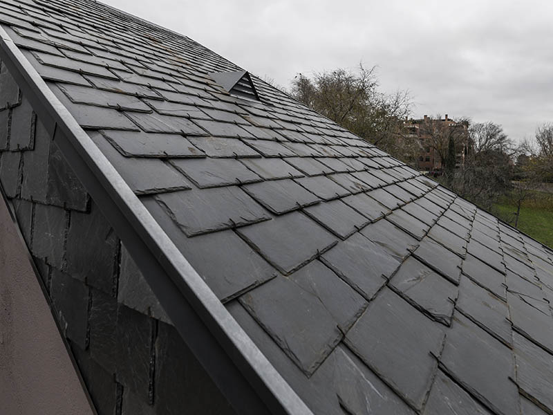 Closeup of new synthetic slate roof on residential home