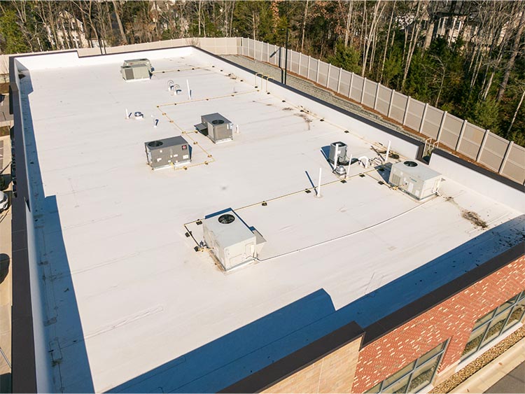 Commercial building with a new flat roofing system.