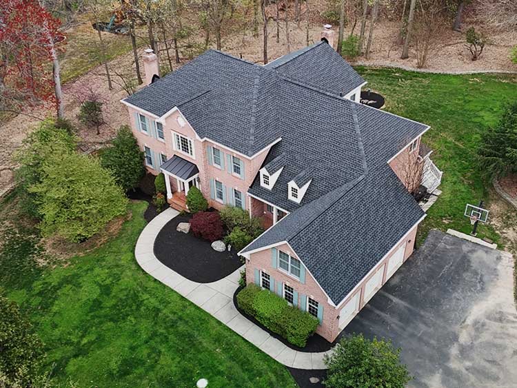 Completed roof replacement project by AC Matthews