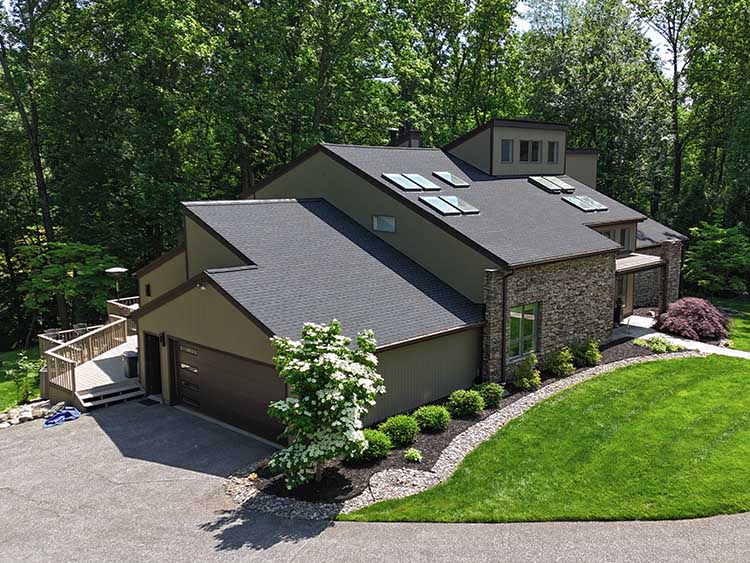 New modern shingle roof by AC Matthews.